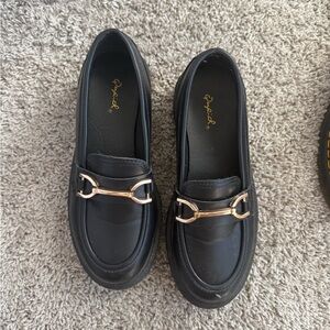 Black Loafers with Gold Accent